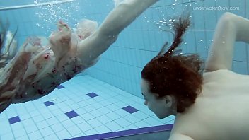 Two hot hairy beauties underwater